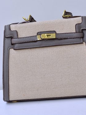 Beige and Brown Structured Handbag with Gold Lock Closure