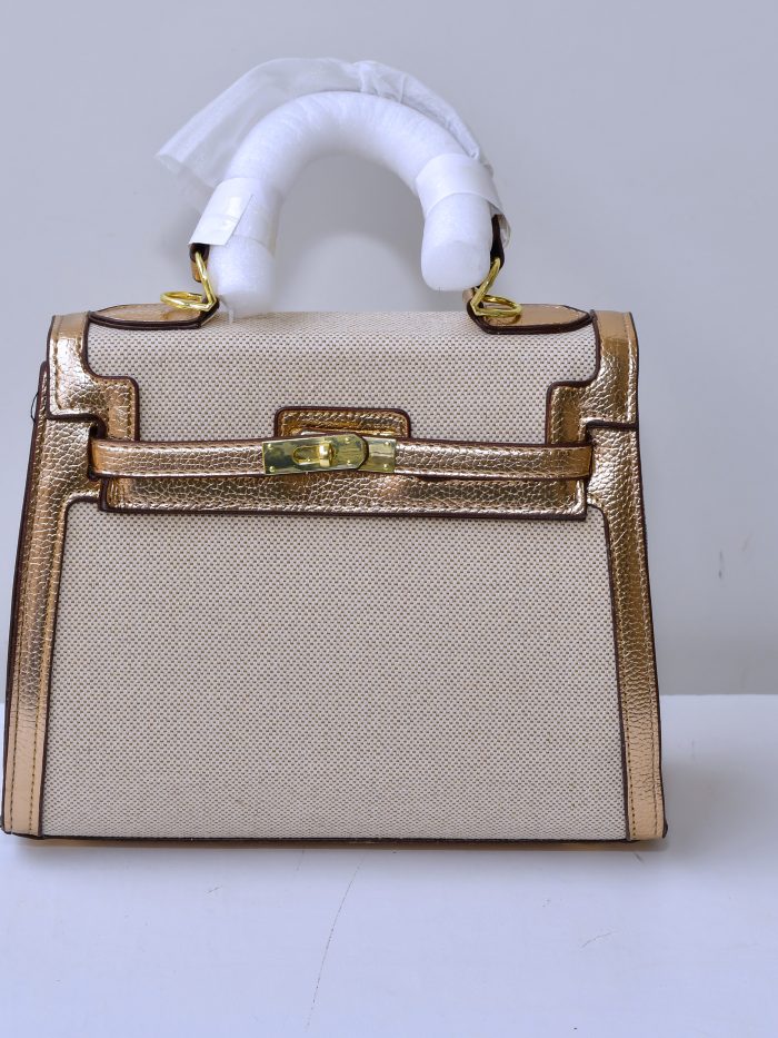 Elegant Gold and Beige Leather Handbag with Gold Detailing